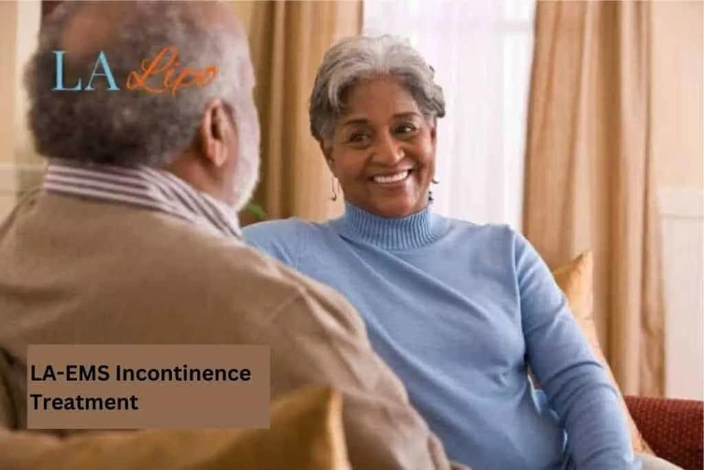 Couple sat smiling at each other - LA-EMS treatment World's End