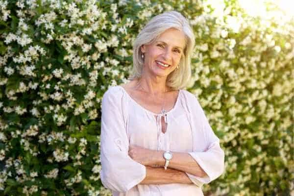 Older woman happy with urinary incontinence treatment World's End